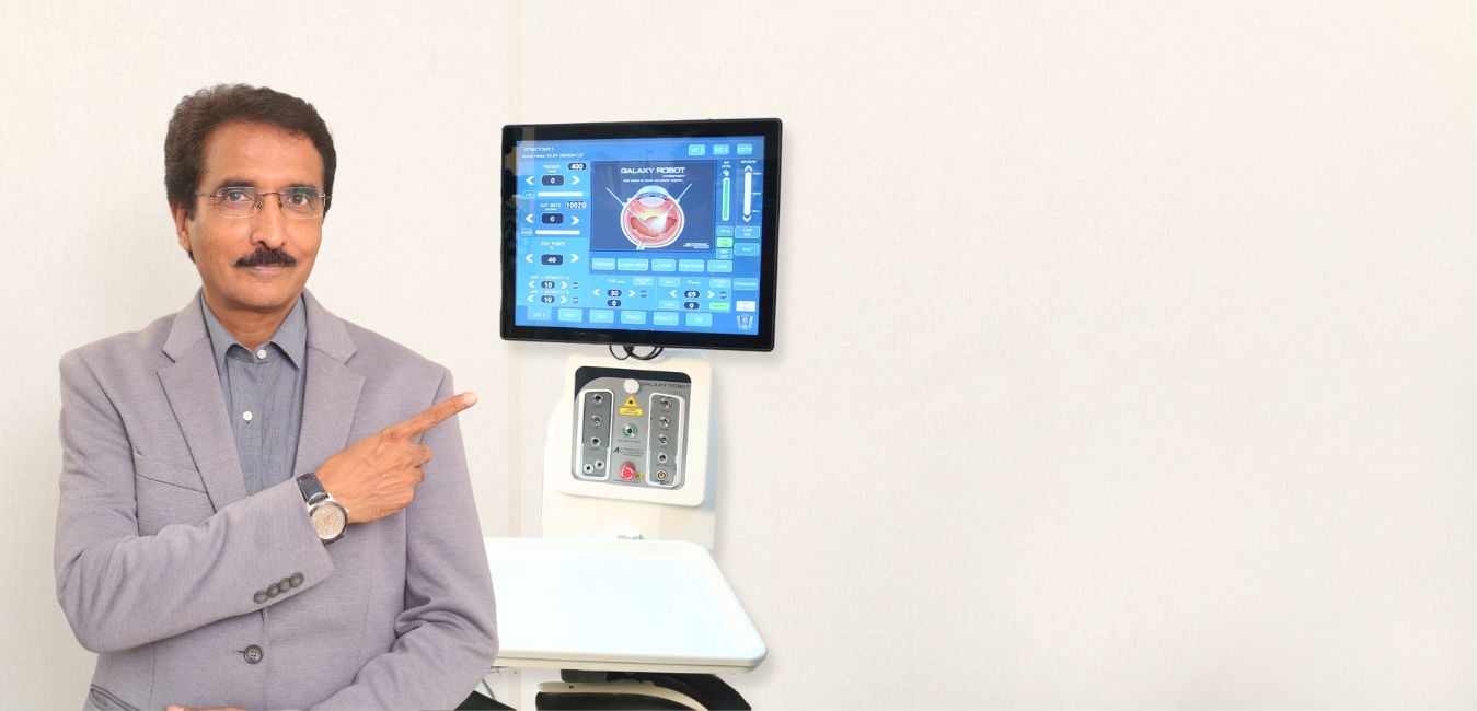 Dr. Deepak Vaidya with robot galaxy use for eye treatment